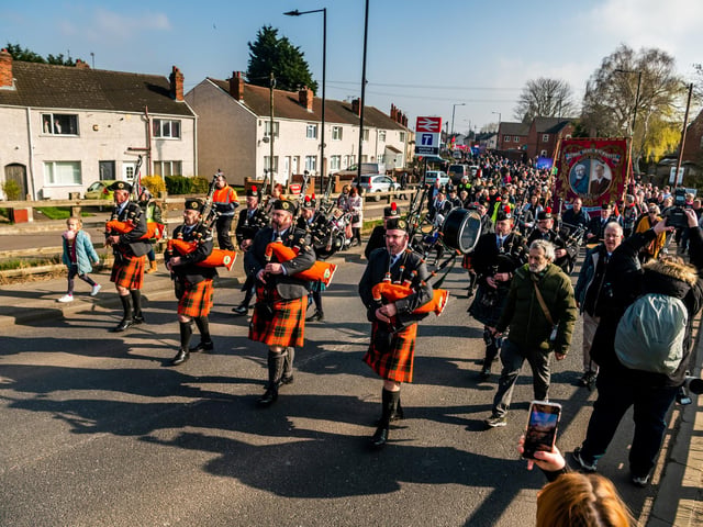 The parade was led by the Doncaster & District, & East Yorkshire Pipe Band plus the Armthorpe Elmfield Brass Band. Picture By Yorkshire Post Photographer,  James Hardisty. Date: 9th March 2024.