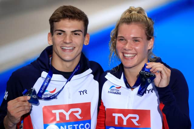 Ross Haslam, before injuries took their toll, with Grace Reid posing with their Silver Medals after the Mixed Synchronised 3m Springboard final at the European Championships Glasgow 2018 in Edinburgh (Picture: Marc Atkins/Getty Images)