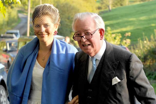 The current Earl of Halifax, Peter Wood, pictured with his daughter Joanna at her wedding in Yorkshire in 2011, is a friend of King Charles and Queen Camilla