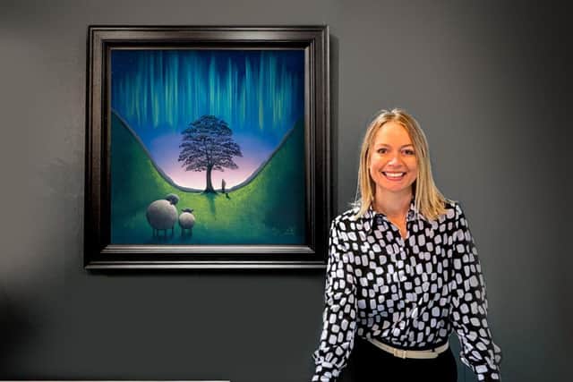 Lucy Pittaway with her Sycamore gap tree painting