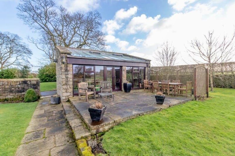 This garden room with kitchen is perfect for entertaining or relaxing in whatever the weather