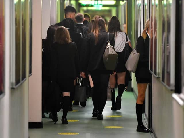 Pupils walk between classrooms. (Pic credit: Anthony Devlin / Getty Images)