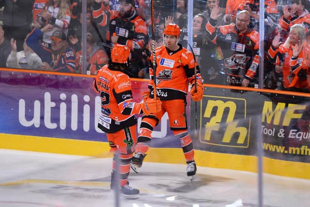 EARLY STRIKE: Scott Allen celebrates putting Sheffield Steelers ahead after just 59 seconds against Guildford Flames. Picture courtesy of Dean Woolley/EIHL.