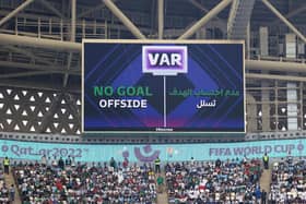 LUSAIL CITY, QATAR - NOVEMBER 22: The LED board shows the VAR decision to rule out a goal by Lautaro Martinez due to an offside during the FIFA World Cup Qatar 2022 Group C match between Argentina and Saudi Arabia at Lusail Stadium on November 22, 2022 in Lusail City, Qatar. (Photo by Catherine Ivill/Getty Images)