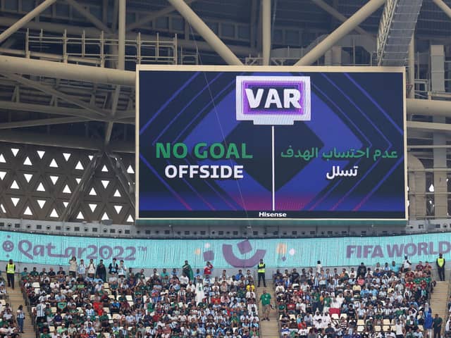 LUSAIL CITY, QATAR - NOVEMBER 22: The LED board shows the VAR decision to rule out a goal by Lautaro Martinez due to an offside during the FIFA World Cup Qatar 2022 Group C match between Argentina and Saudi Arabia at Lusail Stadium on November 22, 2022 in Lusail City, Qatar. (Photo by Catherine Ivill/Getty Images)
