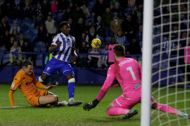 Hull City's Sean McLoughlin (left) attempts to block a shot from Sheffield Wednesday's Di'Shon Bernard during the Sky Bet Championship match at Hillsborough (Picture: Ian Hodgson/PA Wire)