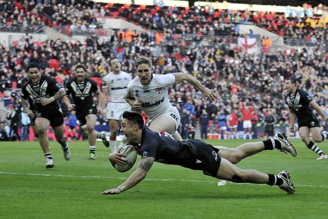 HEARTBREAKING: New Zealand's Shaun Johnson scores the winning try against England at Wembley in the 2013 World Cup semi-final. Picture by Simon Wilkinson/SWpix.com