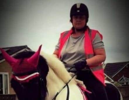 Benefits fraudster Michelle Hanney riding a horse