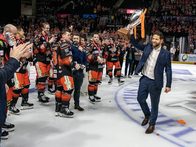 MEMORABLE NIGHT: Sheffield Steelers' head coach Aaron Fox lifts the trophy after his team beat Guildford Flames 3-1 in the Challenge Cup Final at the Utilita Arena on Wednesday. Picture: Tony Johnson
