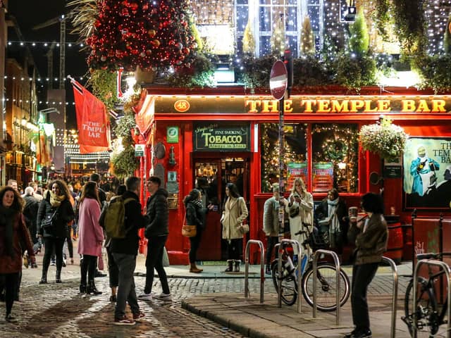 File photo dated 22/01/22 of people out socialising in Temple Bar in Dublin city centre as people attending someone else's stag or hen do typically face paying £779 in the UK or £1,208 if they go abroad, a survey indicates. Picture: Damien Storan/PA Wire