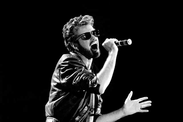 George Michael of Wham performing at the Live Aid concert at Wembley Stadium in London. Credit: PA/PA Wire