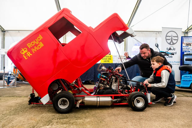 Harrison Legg, aged 7, of York, with his dad Robert looking at PAT1 which holds the Guinness World Record for the World's Fastest 'Coin Operated Ride' of 101 MPH his it's 500cc engine.