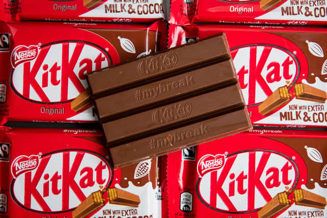KitKat and Nescafe coffee maker Nestle has revealed its net profits tumbled by 45% as cost inflation led the global food and drink giant to hike up the prices of its products.