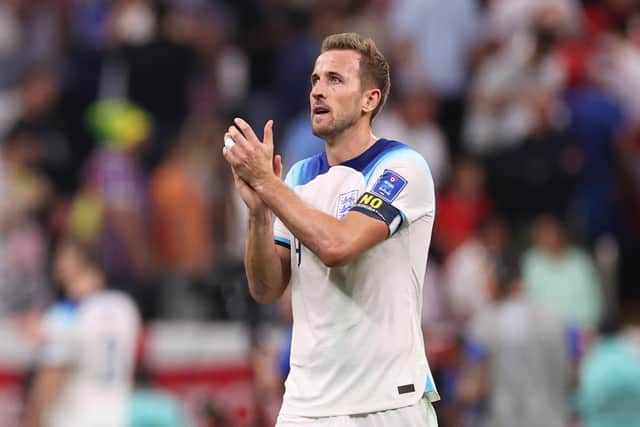 AL KHOR, QATAR - NOVEMBER 25: Harry Kane of England applauds fans after the 0-0 draw the FIFA World Cup Qatar 2022 Group B match between England and USA at Al Bayt Stadium on November 25, 2022 in Al Khor, Qatar. (Photo by Ryan Pierse/Getty Images)