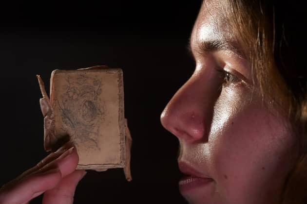 New Exhibition ‘The Brontës and the Wild’, will run throughout 2023 at the Brontë Parsonage Museum in Haworth. Ellen Dando the Visitor Experience Deputy Manager looks at Needle Case with a Birds Nest sketch on by Charlotte Bronte 1829-1832. Picture by Simon Hulme 7th February2023