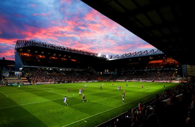 BRADFORD, ENGLAND: A general view of play as the sun sets over the stadium during the Carabao Cup Second Round match between Bradford City and Blackburn Rovers at University of Bradford Stadium on August 23, 2022 in Bradford, England. (Photo by George Wood/Getty Images)
