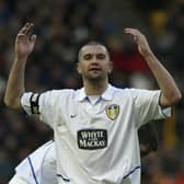 WOLVERHAMPTON, ENGLAND - DECEMBER 28:  Dominic Matteo of Leeds recieves a yellow card during the FA Barclaycard Premiership match between Wolverhampton Wanderers and Leeds United at Molineux on December 28, 2003 in Wolverhampton, England.  (Photo by Jamie McDonald/Getty Images)