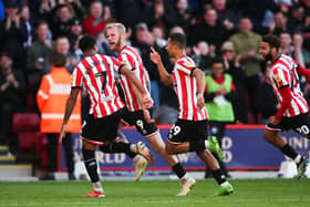 Sheffield United's Oli McBurnie (second left) celebrates scoring their side's first goal of the game against Birmingham City at Bramall Lane. Picture: PA