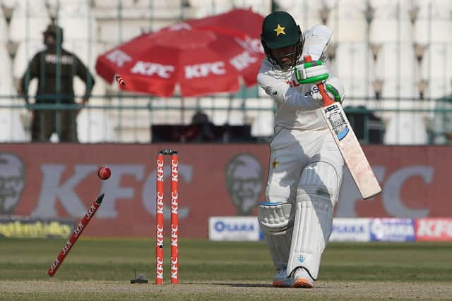 Pakistan's Zahid Mahmood clean bowled by England's Mark Wood (not pictured) during the fourth day of the second cricket Test match between Pakistan and England at the Multan Cricket Stadium (Picture: AAMIR QURESHI/AFP via Getty Images)