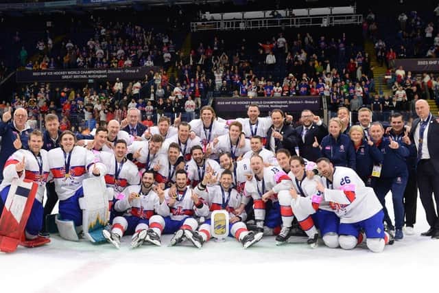 WINNERS: Great Britain's players and staff celebrate their win at Nottingham's Motorpoint Arena on Friday night. Picture courtesy of Dean Woolley/Ice Hockey UK