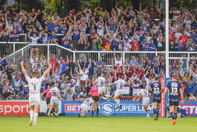 Wakefield fans and players celebrating Jai Whitbread's try. (Photo: Olly Hassell/SWpix.com)