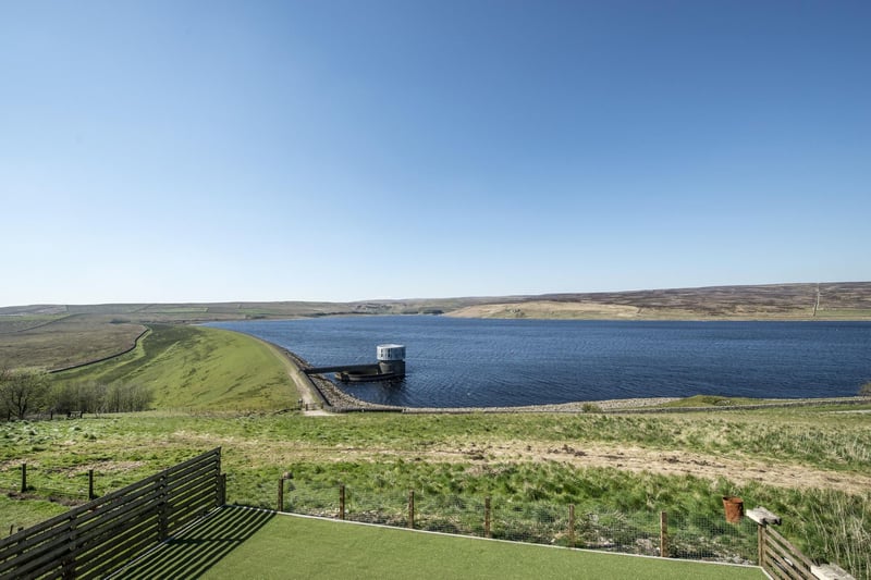 The property overlooks the reservoir and the Dales landscape beyond