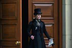 Suranne Jones wearing her iconic black coat and top hat outfit as Anne Lister in the BBC series Gentleman Jack. Picture: Jonathan Gawthorpe