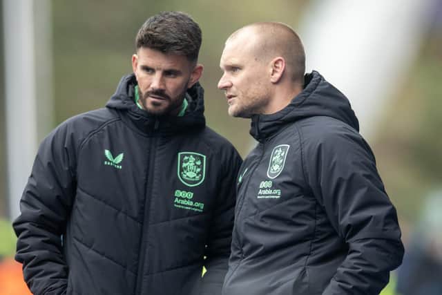 Stead and Huddersfield-born Martin Drury (left) are in interim charge of their hometown club in the absence of Liam Manning (right). Picture: Tony Johnson