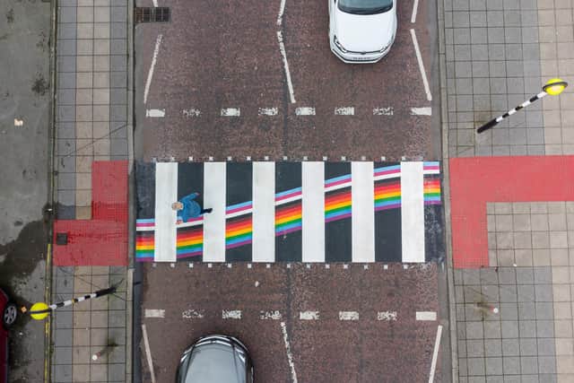 A zebra crossing with 'Tactile Ground Surface Indicators' in red to the sides in Blackpool. Photo: Kelvin Lister-Stuttard.