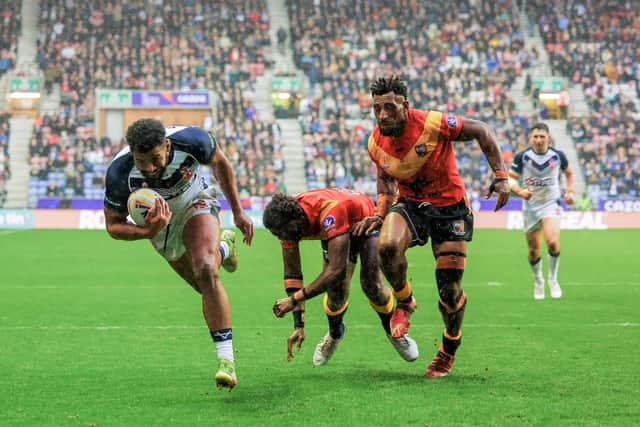 Kallum Watkins dives over to score during the last World Cup in England. (Photo: Alex Whitehead/SWpix.com)