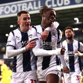 WEST BROMWICH, ENGLAND - DECEMBER 17: Brandon Thomas-Asante of West Bromwich celebrates with Jed Wallace after scoring their third goal during the Sky Bet Championship between West Bromwich Albion and Rotherham United at The Hawthorns on December 17, 2022 in West Bromwich, England. (Photo by Nathan Stirk/Getty Images)