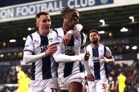 WEST BROMWICH, ENGLAND - DECEMBER 17: Brandon Thomas-Asante of West Bromwich celebrates with Jed Wallace after scoring their third goal during the Sky Bet Championship between West Bromwich Albion and Rotherham United at The Hawthorns on December 17, 2022 in West Bromwich, England. (Photo by Nathan Stirk/Getty Images)