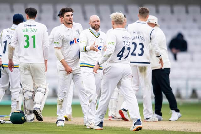 TAKE OF THE UNEXPECTED: Yorkshire's Adam Lyth shakes hands and consoles with his players after his side's loss to Leicestershire. Picture by Allan McKenzie/SWpix.com