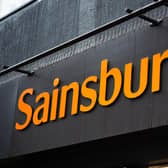 Supermarket giant Sainsbury’s has improved its profit outlook as it revealed stronger grocery sales over the past half-year. (Photo by James Manning/PA Wire)