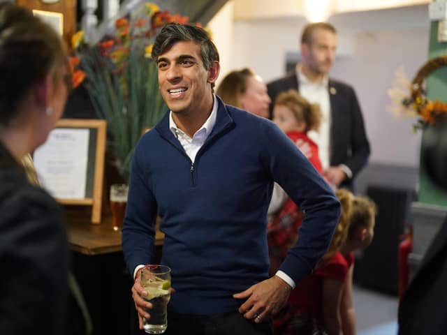 Prime Minister Rishi Sunak during a visit to a pub. PIC: Jacob King/PA Wire