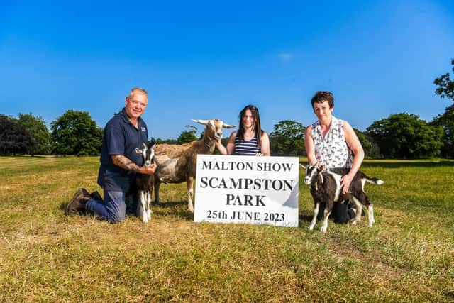 Vic Bruce, Vice Chairman of Malton Show, and Anne Welham, Secretary of Malton Show, with young farmer Emma Allen, of North Farm, Ryton, near Malton, and some of her goats
