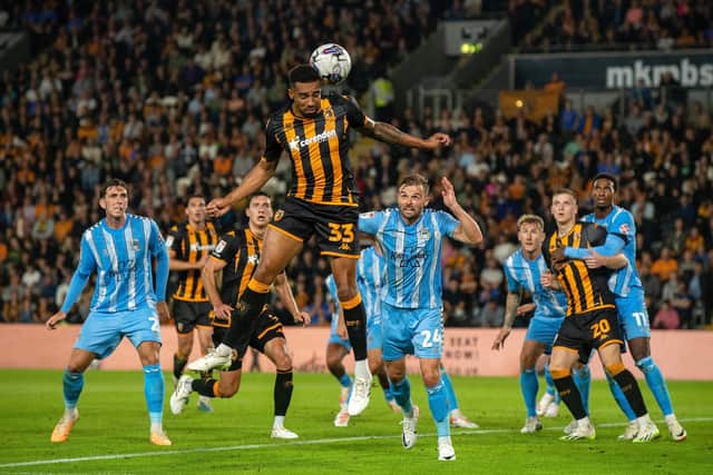 Cyrus Christie rises to head a corner for Hull City v Coventry City. (Picture: Bruce Rollinson)
