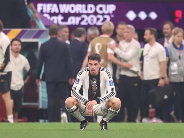 NIGHTMARE: Kai Havertz contemplates Germany's World Cup elimination as coach Danny Rohl looks on in the background (left)
