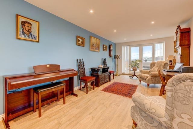 The owner uses this ground floor room as a music room but it could be a second sitting room or a bedroom with space for an ensuite