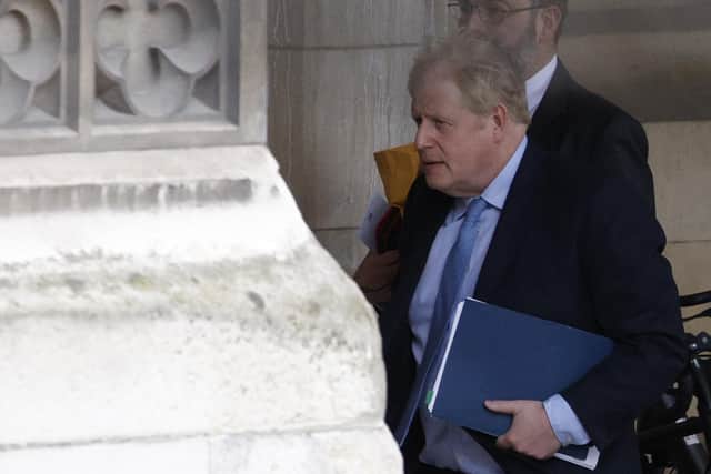 Boris Johnson on his way to a hearing at Parliament in London. PIC: AP Photo/David Cliff