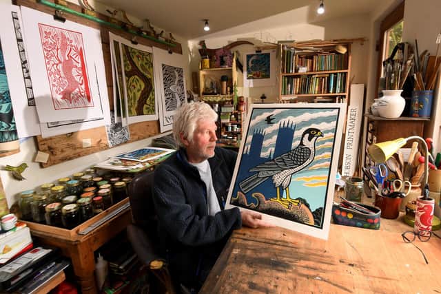 Gerard with the lino cut of the Peregrine falcon that will soon be on sale at York Minster as a limited edition print