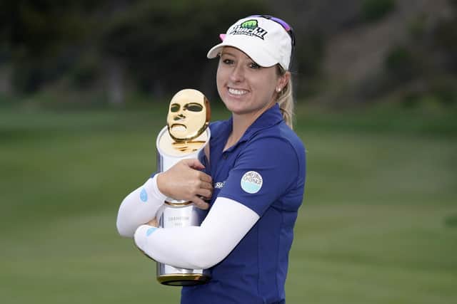 Jodi Ewart Shadoff, of England, poses with her trophy after winning the MEDIHEAL Championship golf tournament Sunday, Oct. 9, 2022, in Camarillo, Calif. (AP Photo/Mark J. Terrill)