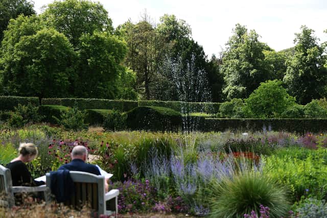 Visitors enjoy the gardens