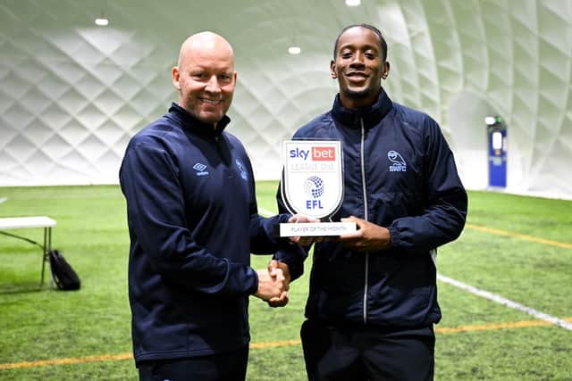 Sheffield Wednesday striker Jamal Lowe has been named as League One's player of the month for August. He is pictured with Owls boss Henrik Pedersen, shortlisted for the manager's award.