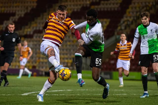 Andy Cook and Amara Nallo challenge for the ball during Bradford City's game with Liverpool U21 (Picture: Bruce Rollinson)