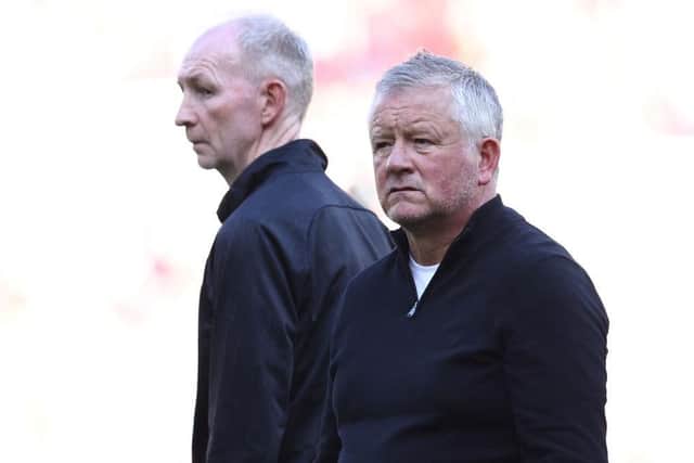 SPLIT UP: Sheffield United released Chris Wilder's erstwhile assistant Alan Knill (left) this summer (Image: Darren Staples / AFP)