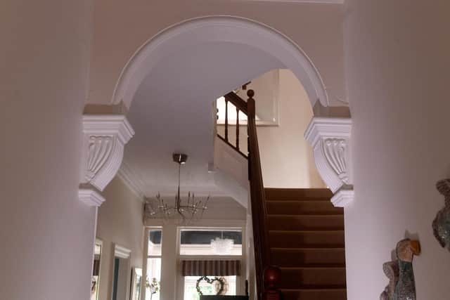 The period staircase remains intact and a main feature of the house