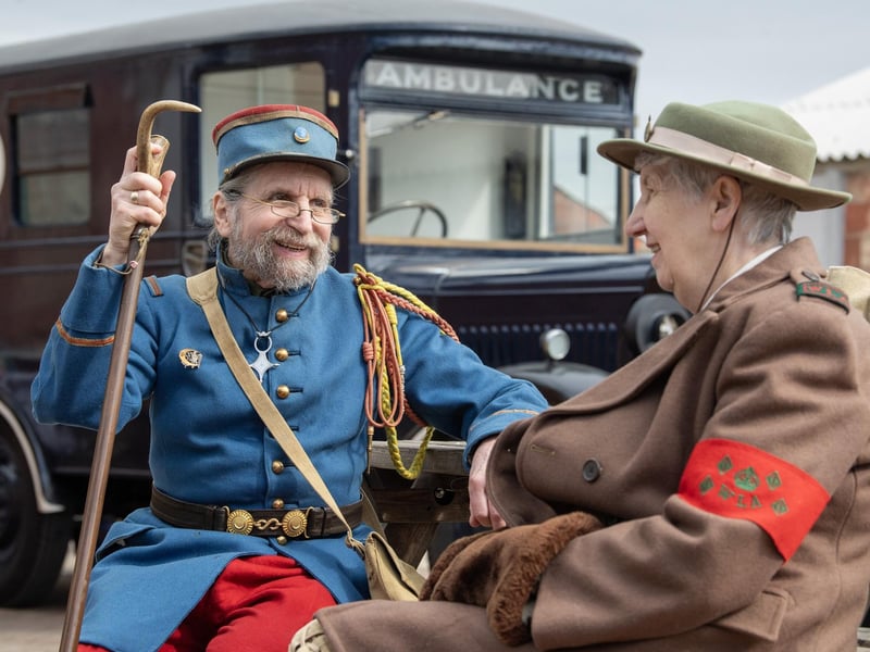 Re-enactors David Farrance dressed in a 1937 French 21st Tirailleurs uniform with Pauline North representing the women's land army.