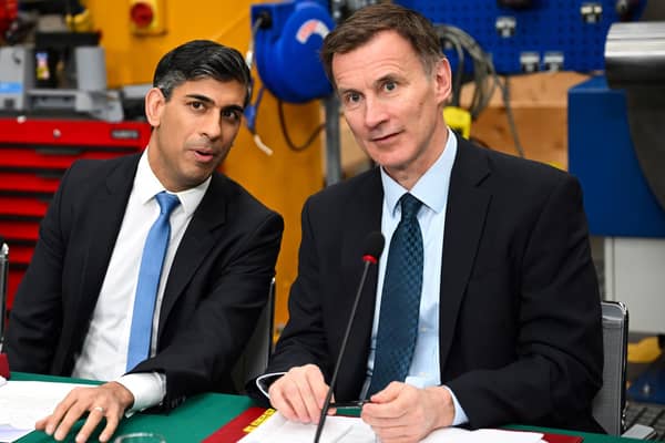 Prime Minister Rishi Sunak (left) and Chancellor of the Exchequer Jeremy Hunt, during a cabinet meeting at a factory in East Yorkshire. PIC: Paul Ellis/PA Wire