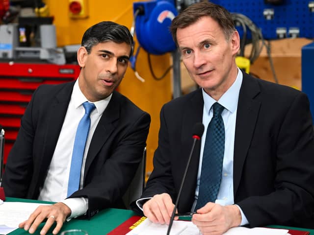 Prime Minister Rishi Sunak (left) and Chancellor of the Exchequer Jeremy Hunt, during a cabinet meeting at a factory in East Yorkshire. PIC: Paul Ellis/PA Wire